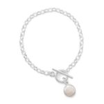 Sterling silver rolo link bracelet with bezel set coin pearl