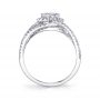Side profile of a white gold diamond engagement ring from the Sylvie Collection featuring a prominent round diamond and an open weaving diamond pattern