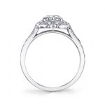 Side profile of a white gold diamond engagement ring featuring a floral halo design