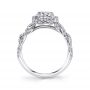 Side profile of a white gold diamond engagement ring from the Sylvie Collection featuring a twisting diamond halo and shank