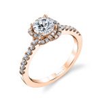 A rose gold diamond engagement ring from the Sylvie Collection featuring a braided halo around the center stone