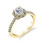 A yellow gold diamond engagement ring from the Sylvie Collection featuring a braided halo around the center stone