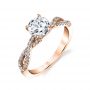 A rose gold diamond engagement ring from the Sylvie Collection featuring a twisting diamond shank and round diamond