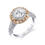 White gold diamond vintage style engagement ring with rose gold accents and a halo setting from the Sylvie Collection