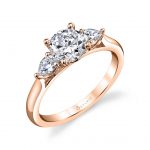 Rose gold diamond engagement ring from the Sylvie Collection featuring a large round diamond with a pear shaped diamond on either side