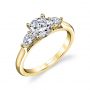 Yellow gold diamond engagement ring from the Sylvie Collection featuring a large round diamond with a pear shaped diamond on either side