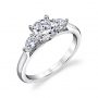 White gold diamond engagement ring from the Sylvie Collection featuring a large round diamond with a pear shaped diamond on either side