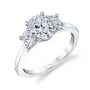 A white gold three-stone diamond engagement ring from the Sylvie Collection featuring three oval shaped diamonds