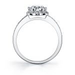 Side profile of a white gold diamond engagement ring featuring a milgrain accented floral shaped halo