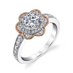 A white gold diamond engagement ring from the Sylvie Collection featuring a halo around the center stone with floral and rose gold accents