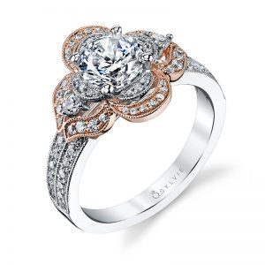 A floral themed white and rose gold diamond engagement ring from the Sylvie Collection with "petals" set with diamonds around a round diamond