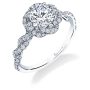 A white gold diamond engagement ring from the Sylvie Collection featuring a twisting diamond halo and shank