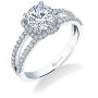 A white gold diamond engagement ring from the Sylvie Collection featuring a twisting halo type design with a split shank