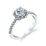 A white gold diamond engagement ring from the Sylvie Collection featuring a braided halo around the center stone