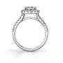 Side profile of a white gold diamond engagement ring from the Sylvie Collection featuring a classic halo around a round diamond