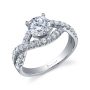 A white gold diamond engagement ring from the Sylvie Collection featuring a twisting diamond shank and prominent round diamond in the center