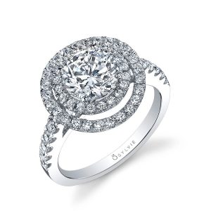 A white gold double halo diamond engagement ring from the Sylvie Collection featuring a prominent center diamond